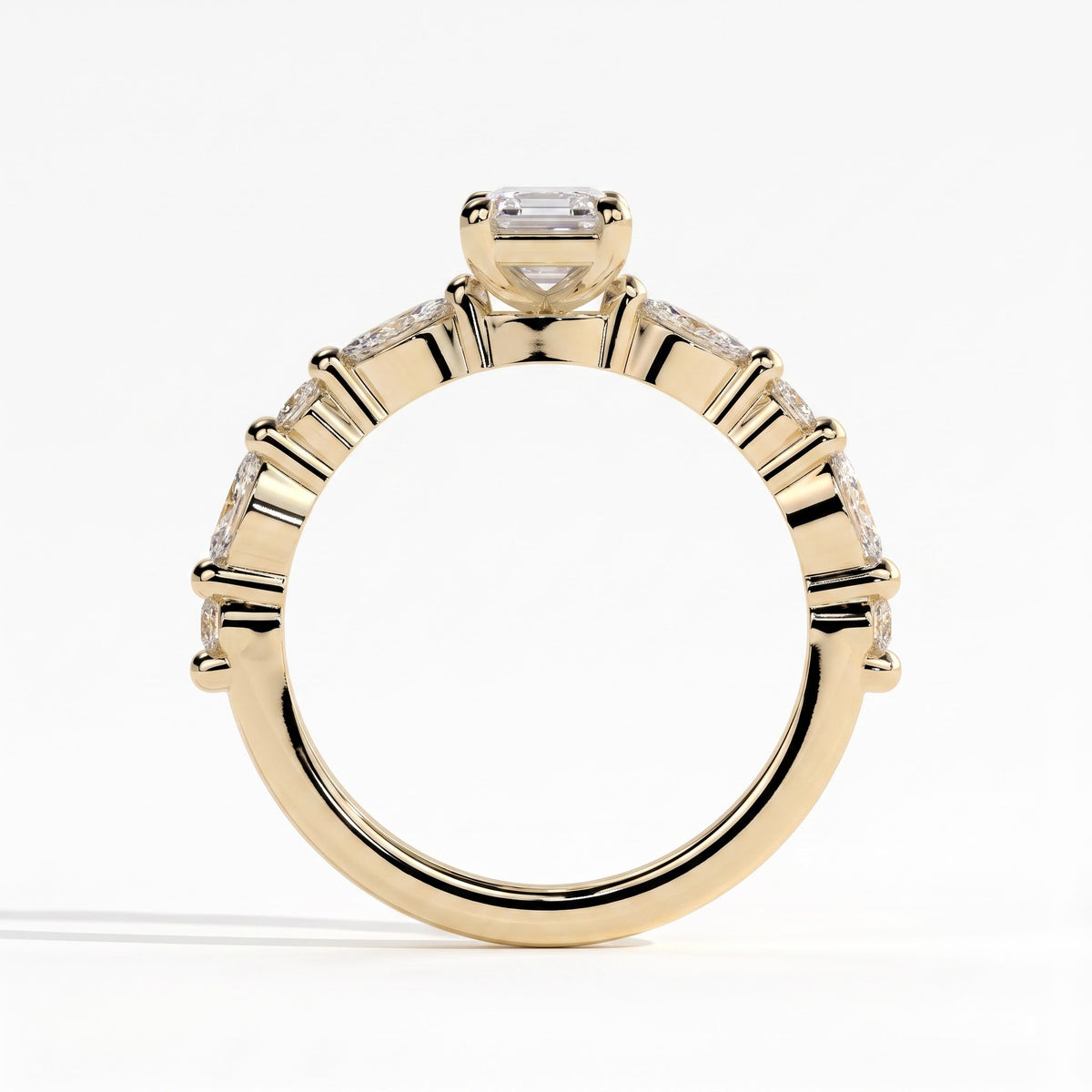 Emerald lab-grown diamond halo engagement ring in 18K (750) yellow gold, side profile 