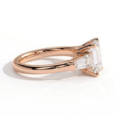 Emerald lab-grown diamond three-stone engagement ring in 18K (750) rose gold, detail view 