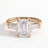 Emerald lab-grown diamond three-stone engagement ring in 18K (750) yellow gold, front view 
