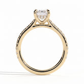 Emerald lab-grown diamond halo engagement ring in 18K (750) yellow gold, side profile 