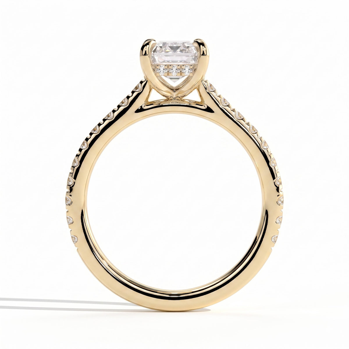 Emerald lab-grown diamond halo engagement ring in 18K (750) yellow gold, side profile 