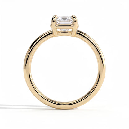 Emerald lab-grown diamond bezel-set solitaire engagement ring in 18K (750) yellow gold, side profile 