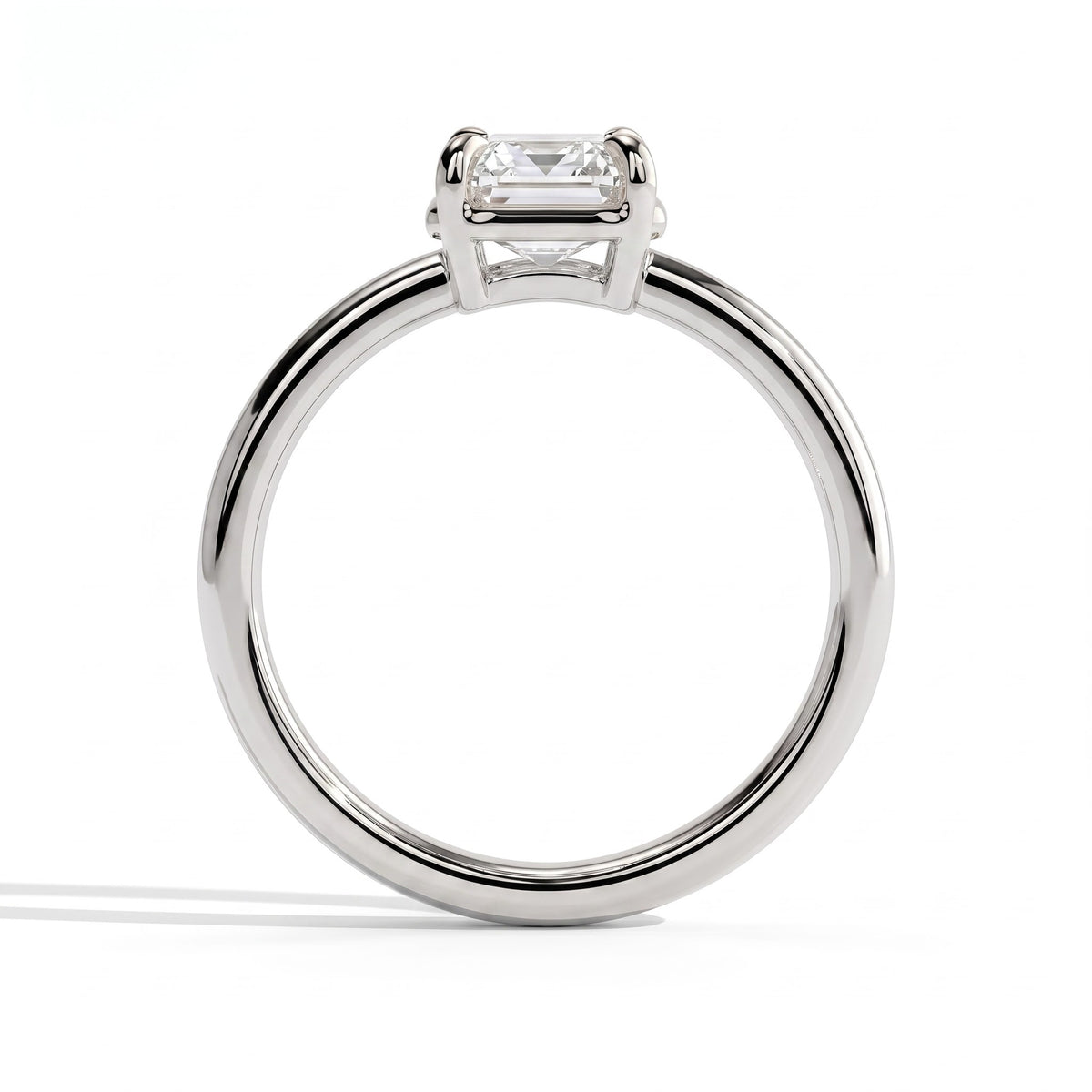 Emerald lab-grown diamond bezel-set solitaire engagement ring in 18K (750) white gold, side profile 