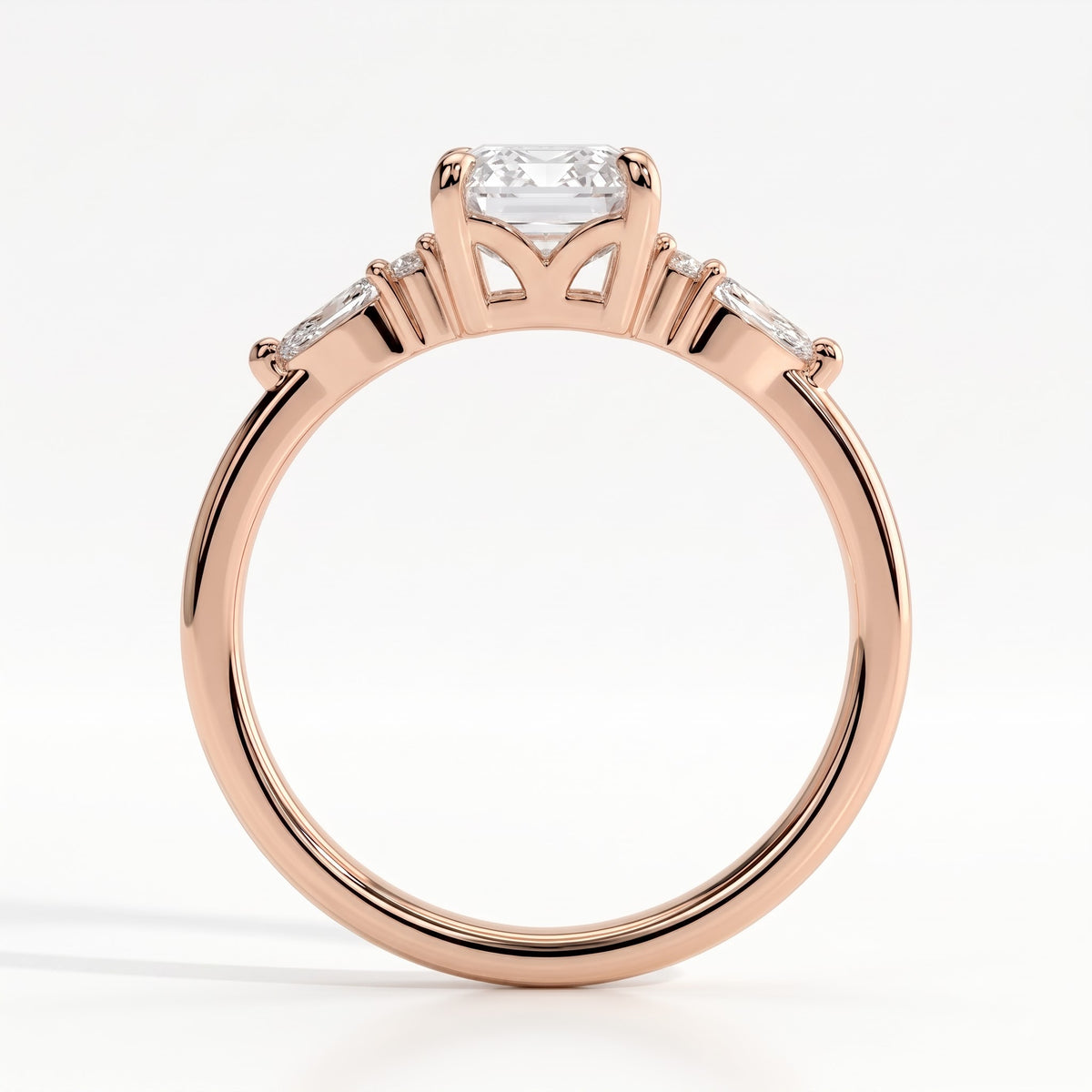 Emerald lab-grown diamond halo engagement ring in 18K (750) rose gold, side profile 