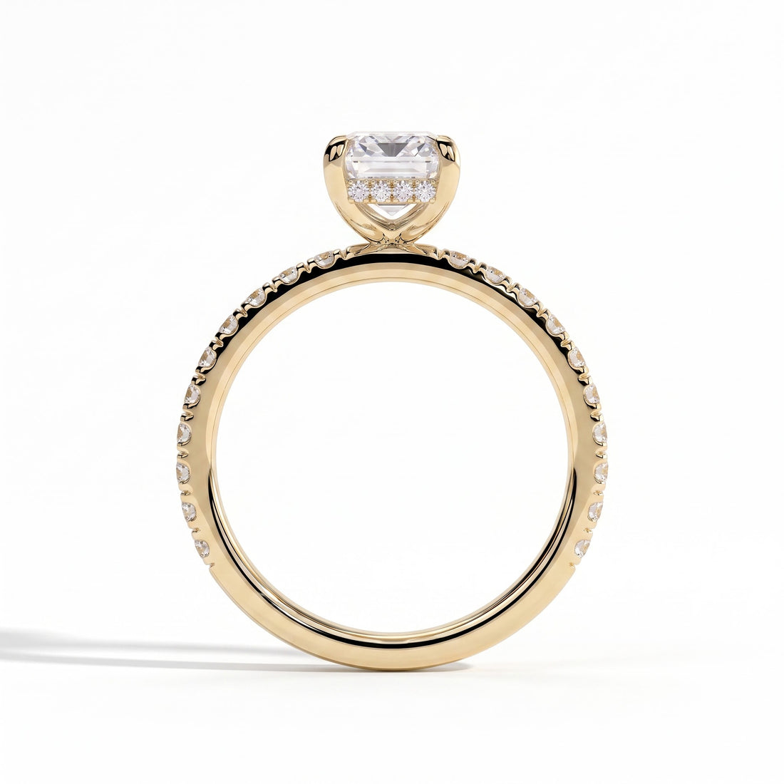 Emerald lab-grown diamond halo engagement ring in 14K (585) yellow gold, side profile 
