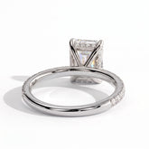 Emerald lab-grown diamond halo engagement ring in 18K (750) white gold, on white background 