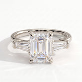 Emerald lab-grown diamond three-stone engagement ring in 950 platinum, front view 
