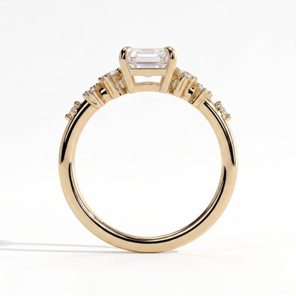 Emerald lab-grown diamond three-stone engagement ring in 18K (750) yellow gold, side profile 