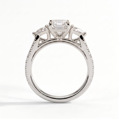 Emerald lab-grown diamond three-stone engagement ring in 18K (750) white gold, side profile 
