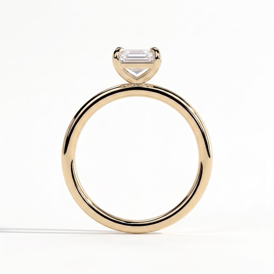 Emerald lab-grown diamond solitaire engagement ring in 14K (585) yellow gold, side profile 