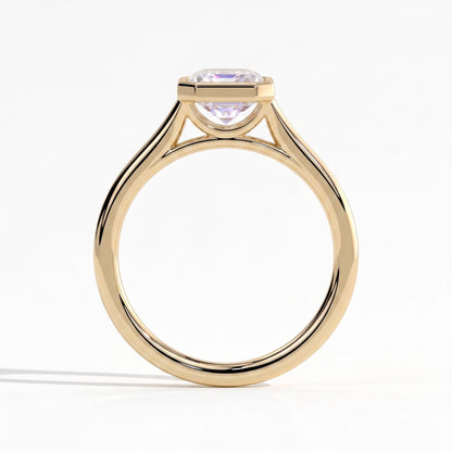 Emerald lab-grown diamond bezel-set solitaire engagement ring in 14K (585) yellow gold, side profile 