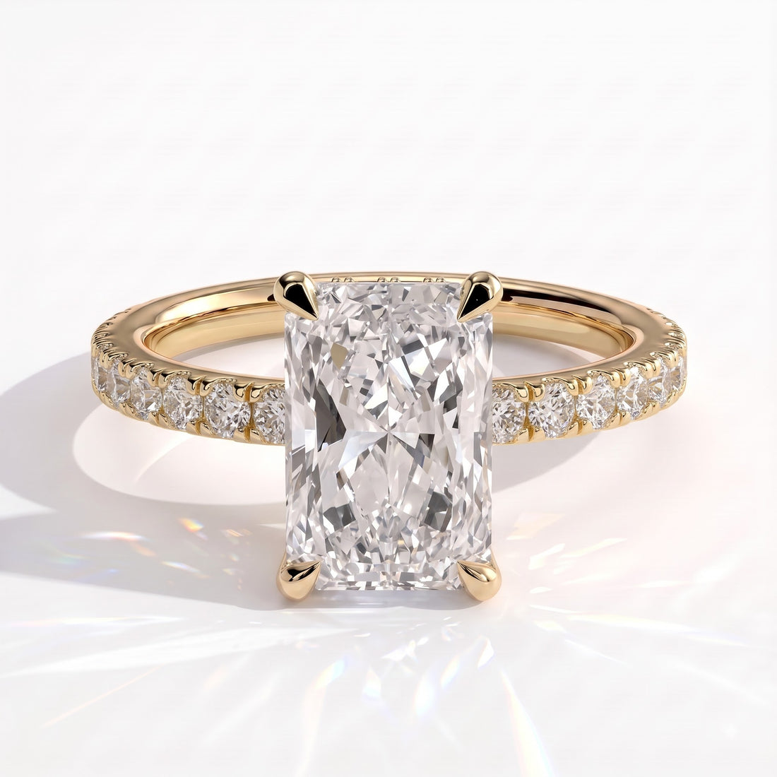 Radiant lab-grown diamond halo engagement ring in 14K (585) yellow gold, front view 