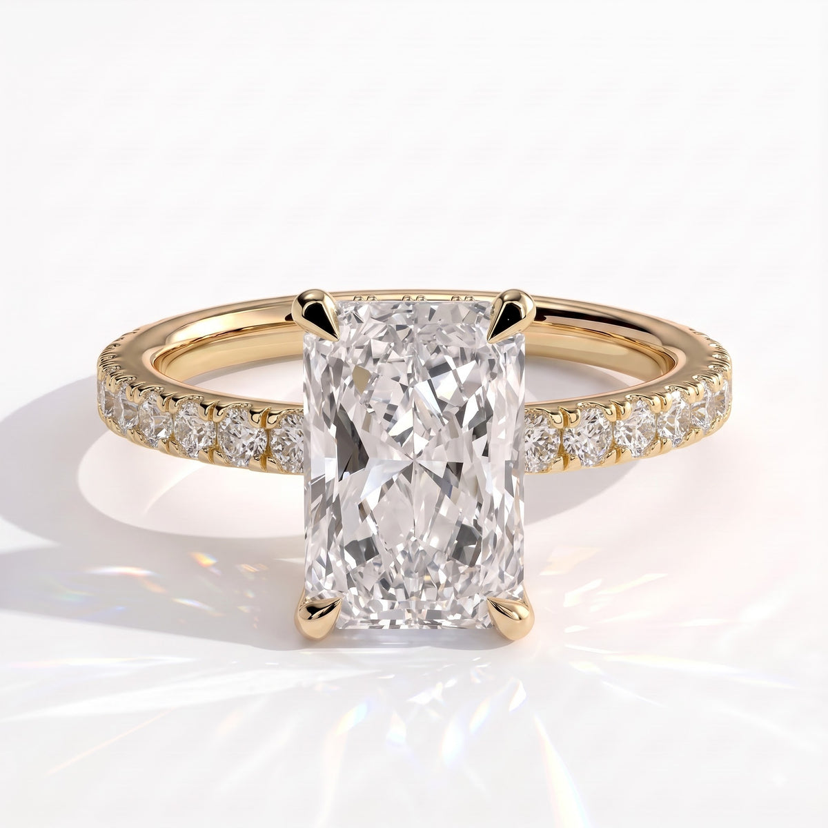 Radiant lab-grown diamond halo engagement ring in 14K (585) yellow gold, front view 