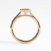 Radiant lab-grown diamond bezel-set solitaire engagement ring in 14K (585) yellow gold, side profile 