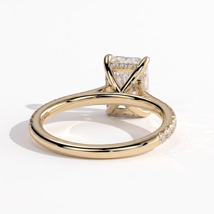 Radiant lab-grown diamond halo engagement ring in 14K (585) yellow gold, on white background 