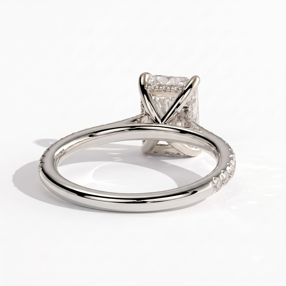 Radiant lab-grown diamond halo engagement ring in 14K (585) white gold, on white background 