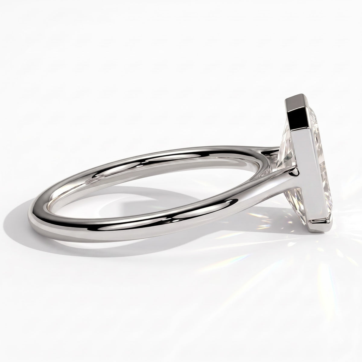 Radiant lab-grown diamond bezel-set solitaire engagement ring in 18K (750) white gold, detail view 
