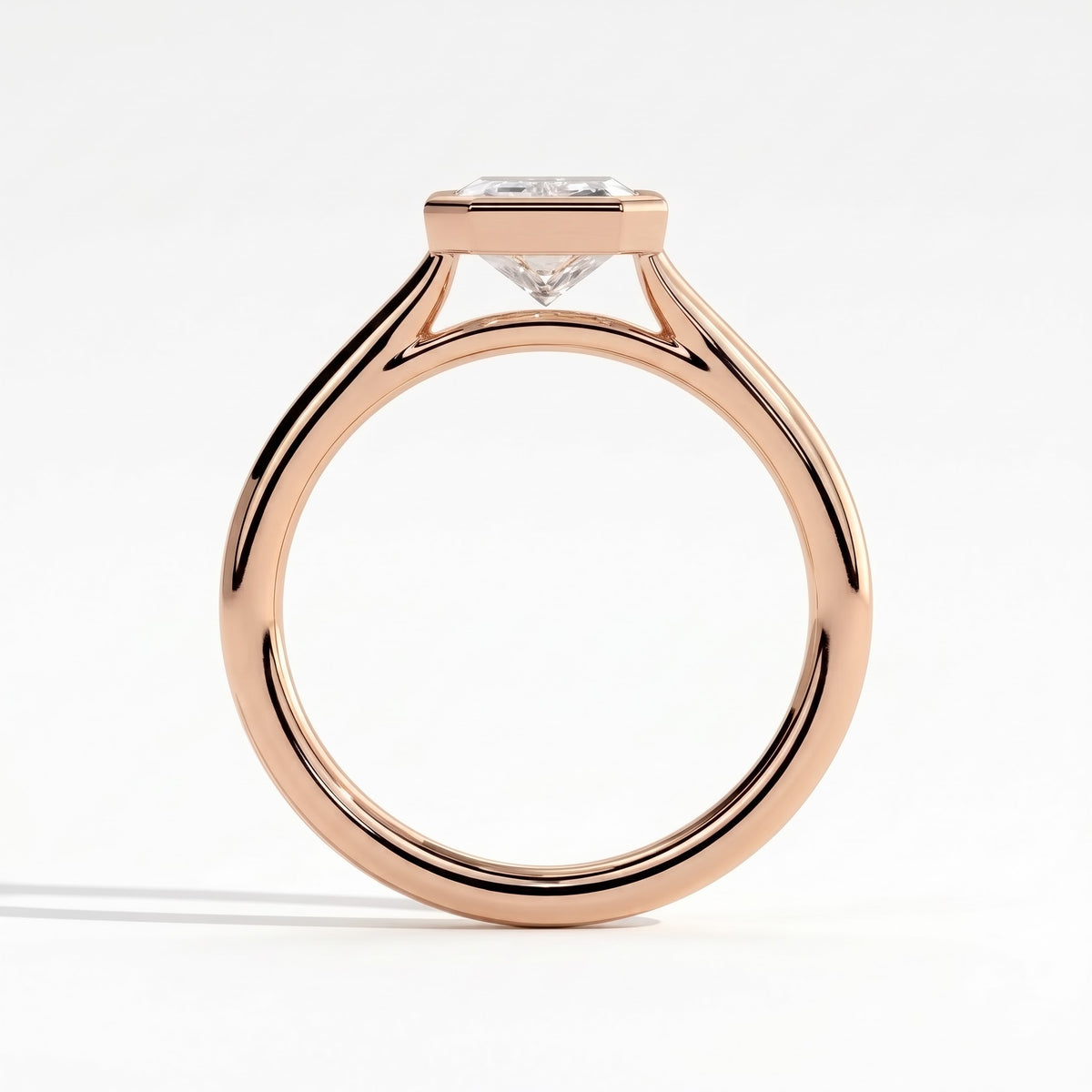 Radiant lab-grown diamond bezel-set solitaire engagement ring in 18K (750) rose gold, side profile 
