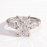 Radiant lab-grown diamond three-stone engagement ring in 18K (750) white gold, front view 