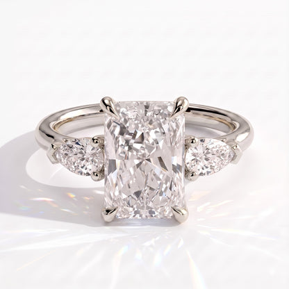 Radiant lab-grown diamond three-stone engagement ring in 950 platinum, front view 