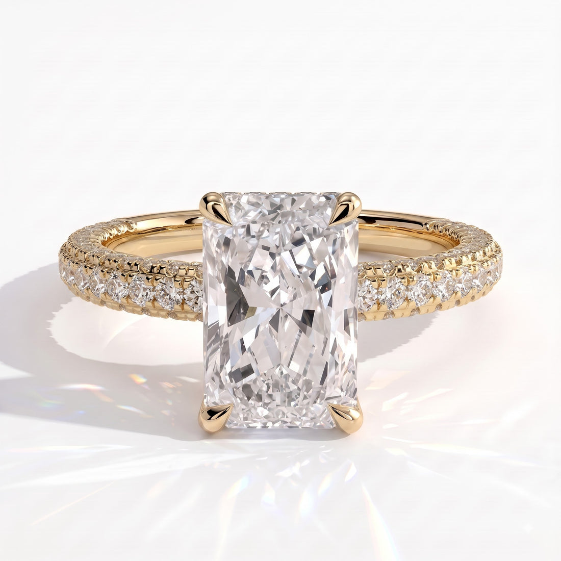 Radiant lab-grown diamond halo engagement ring in 14K (585) yellow gold, front view 
