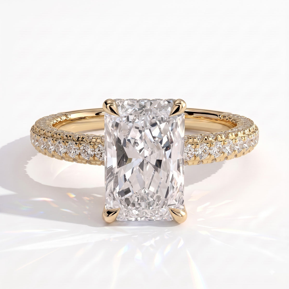 Radiant lab-grown diamond halo engagement ring in 14K (585) yellow gold, front view 