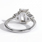 Radiant lab-grown diamond three-stone engagement ring in 950 platinum, on white background 