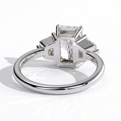 Radiant lab-grown diamond three-stone engagement ring in 950 platinum, on white background 