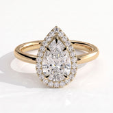 Pear lab-grown diamond halo engagement ring in 14K (585) yellow gold, front view 