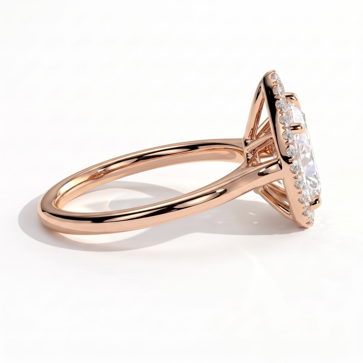 Pear lab-grown diamond halo engagement ring in 18K (750) rose gold, detail view 