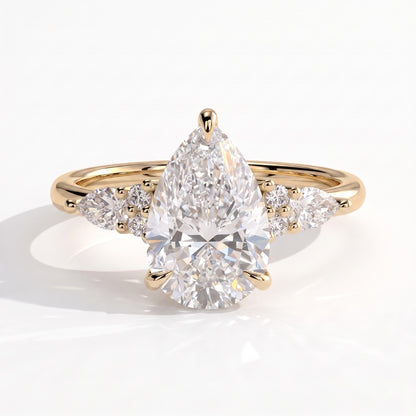 Pear lab-grown diamond halo engagement ring in 18K (750) yellow gold, front view 