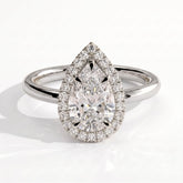 Pear lab-grown diamond halo engagement ring in 950 platinum, front view 