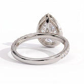 Pear lab-grown diamond halo engagement ring in 18K (750) white gold, on white background 
