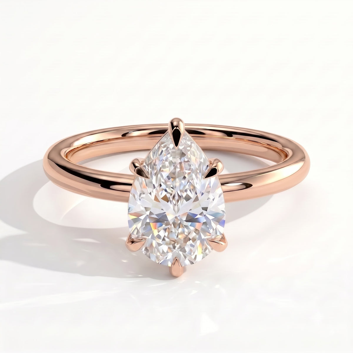 Pear lab-grown diamond solitaire engagement ring in 14K (585) rose gold, front view 