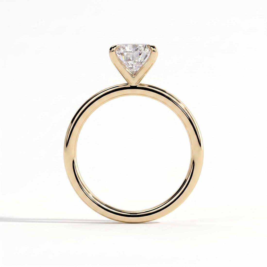 Pear lab-grown diamond solitaire engagement ring in 14K (585) yellow gold, side profile 
