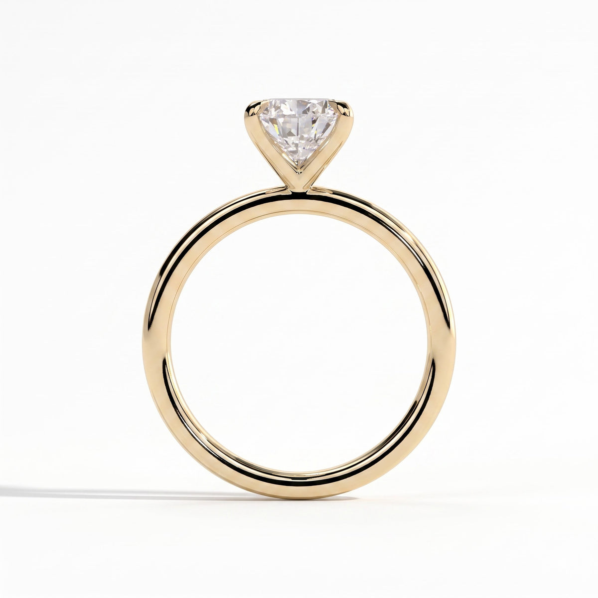 Pear lab-grown diamond solitaire engagement ring in 14K (585) yellow gold, side profile 