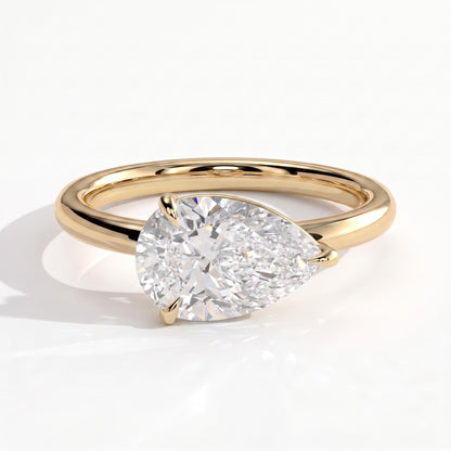Pear lab-grown diamond east-west solitaire engagement ring in 14K (585) yellow gold, front view 