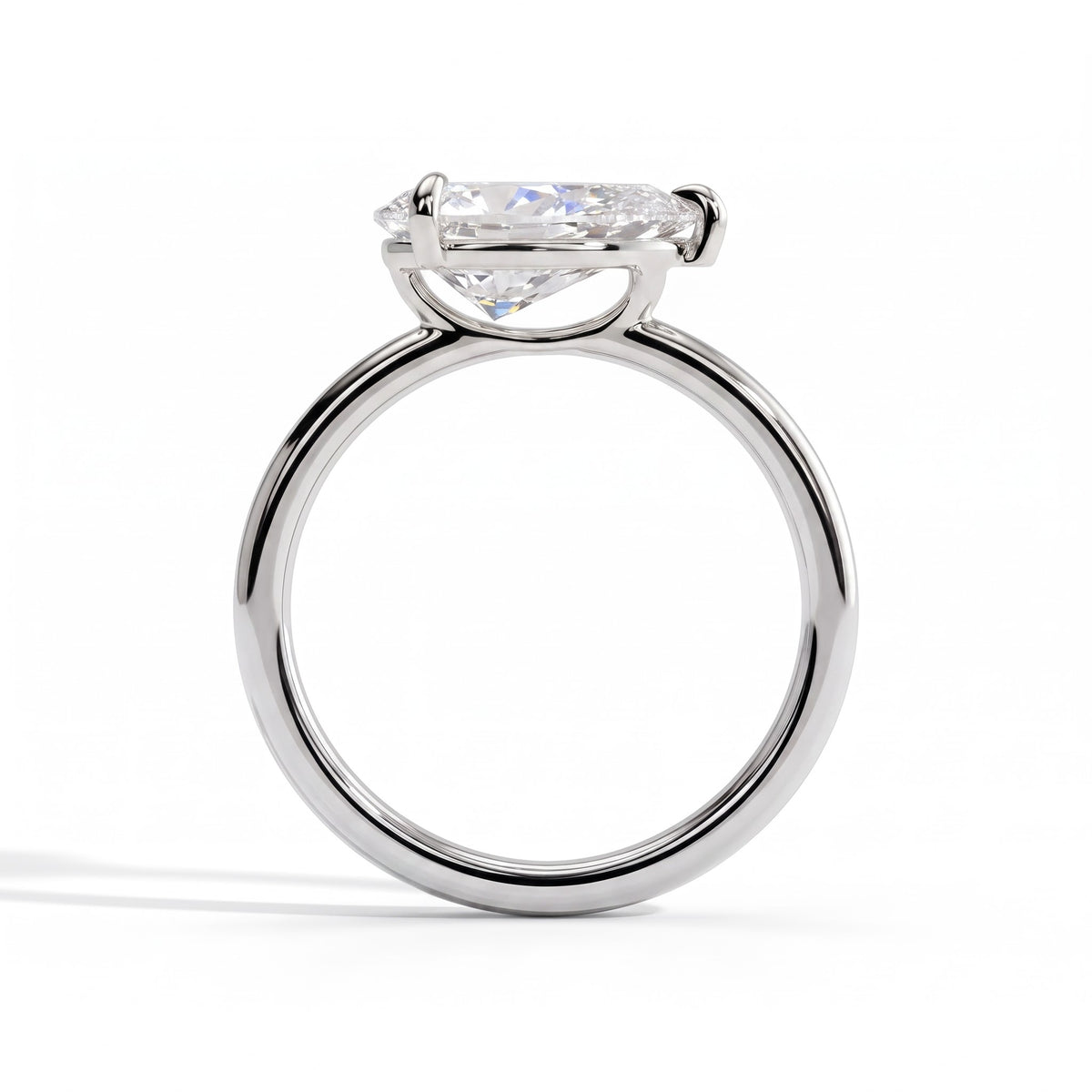 Pear lab-grown diamond east-west solitaire engagement ring in 14K (585) white gold, side profile 