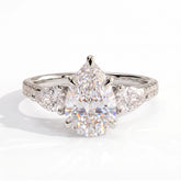 Pear lab-grown diamond three-stone engagement ring in 14K (585) white gold, front view 
