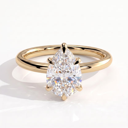 Pear lab-grown diamond solitaire engagement ring in 18K (750) yellow gold, front view 