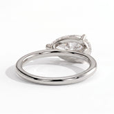 Pear lab-grown diamond east-west solitaire engagement ring in 18K (750) white gold, on white background 