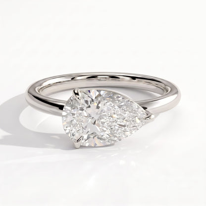 Pear lab-grown diamond east-west solitaire engagement ring in 18K (750) white gold, front view 