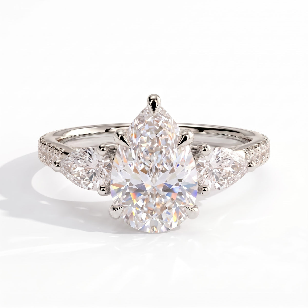 Pear lab-grown diamond three-stone engagement ring in 18K (750) white gold, front view 