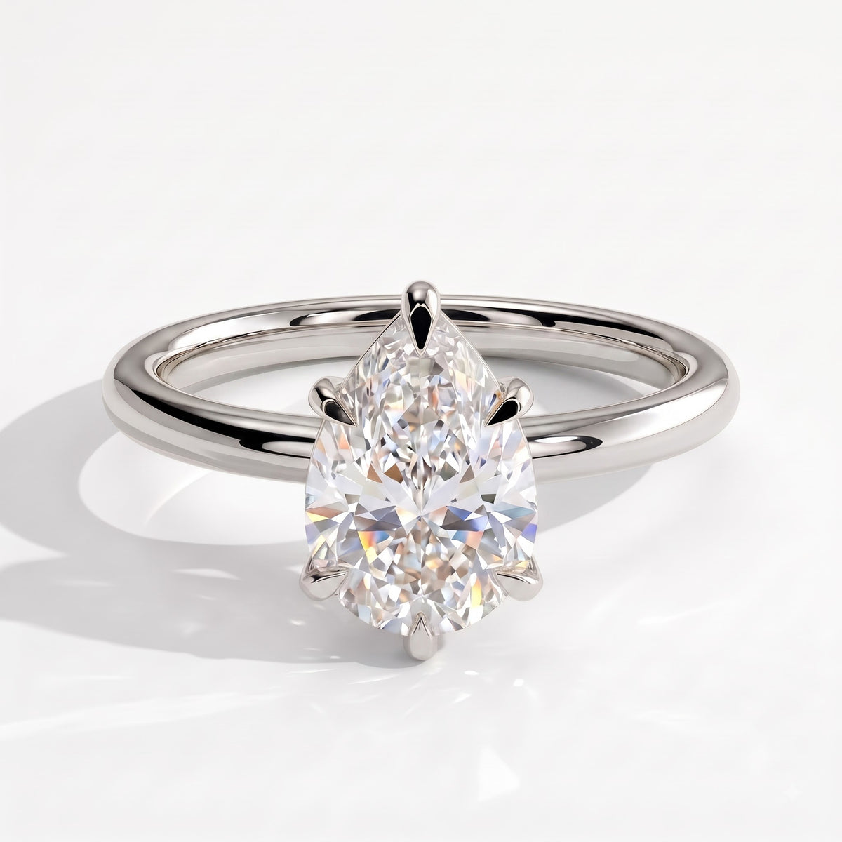 Pear lab-grown diamond solitaire engagement ring in 950 platinum, front view 