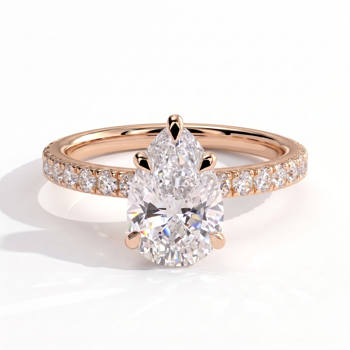 Pear lab-grown diamond halo engagement ring in 14K (585) rose gold, front view 