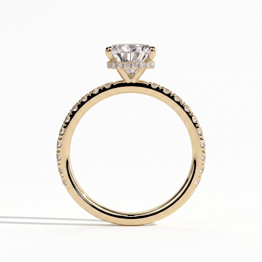 Pear lab-grown diamond halo engagement ring in 14K (585) yellow gold, side profile 