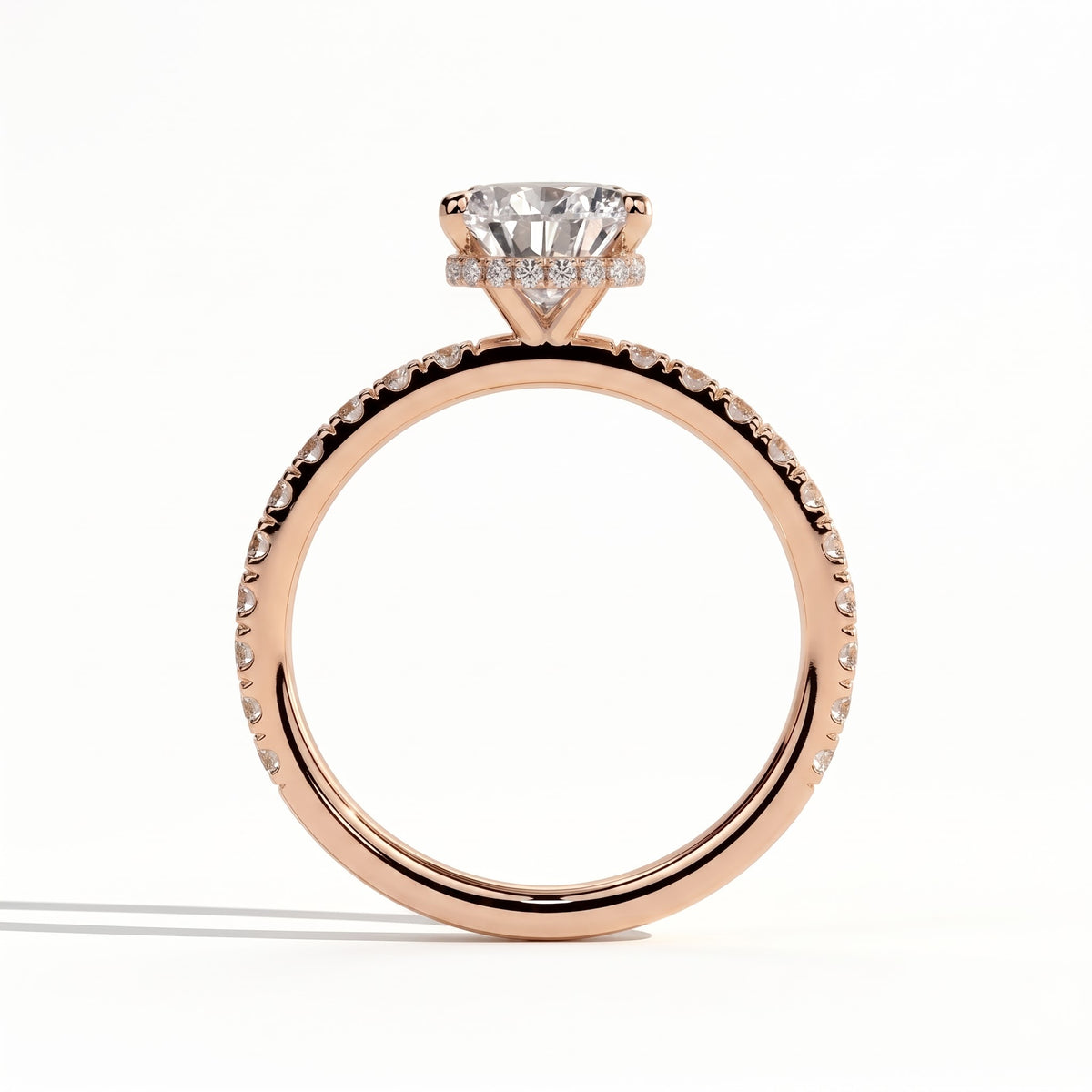 Pear lab-grown diamond halo engagement ring in 14K (585) rose gold, side profile 