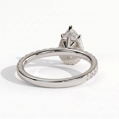 Pear lab-grown diamond halo engagement ring in 18K (750) white gold, on white background 