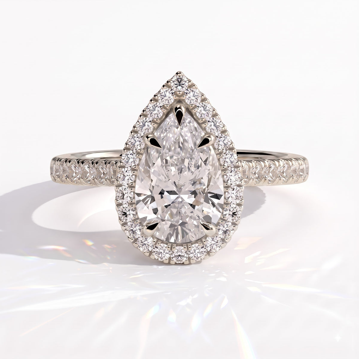 Pear lab-grown diamond halo engagement ring in 14K (585) white gold, front view 
