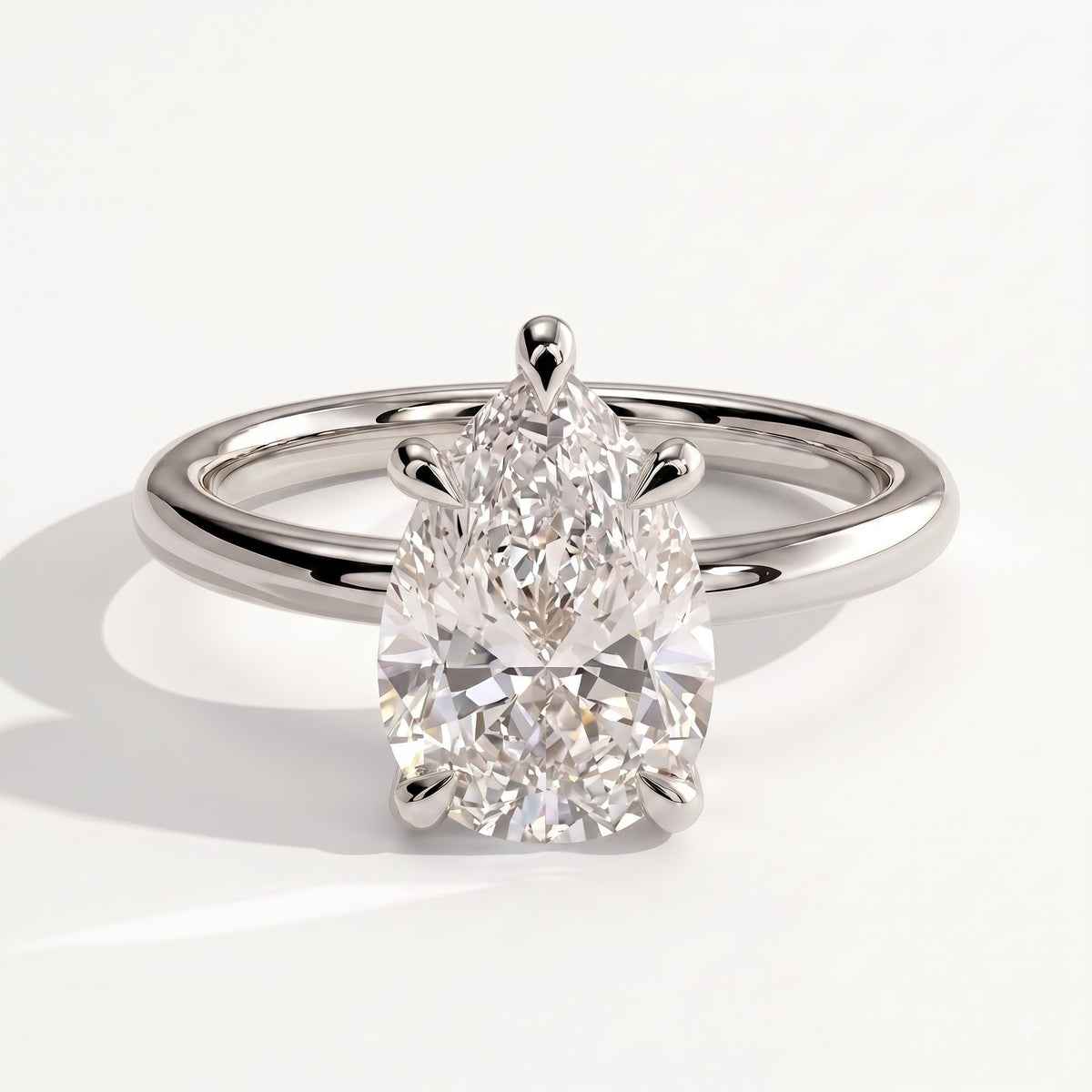 Pear lab-grown diamond solitaire engagement ring in 14K (585) white gold, front view 
